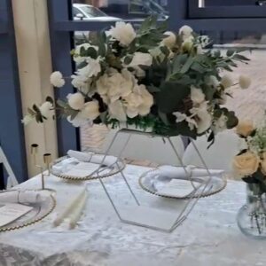 Pentagon white stand with centrepiece flower